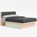Load image into zoomed gallery viewer, Bento light oak storage bed angle view
